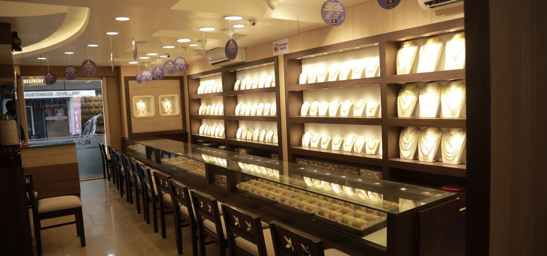 Inside D.A.R JEWELLERY — illuminated display counters at 551 Vysial Street, Coimbatore